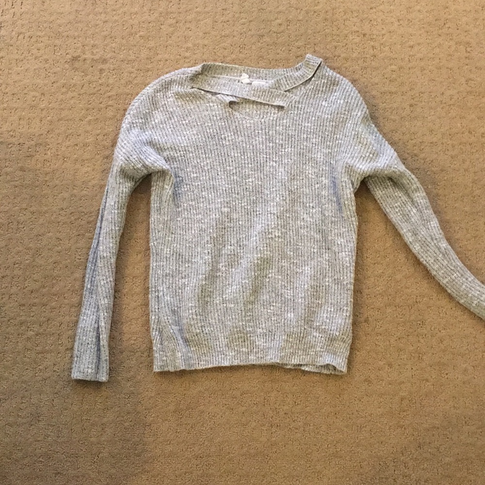 A grey sweater